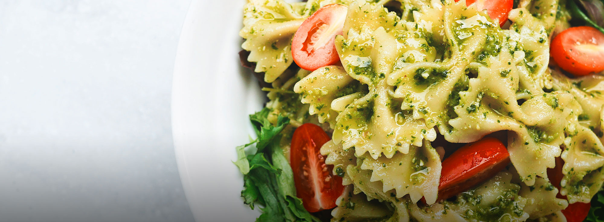 Ricetta: Pasta al pesto di rucola e limone con pomodorini confit